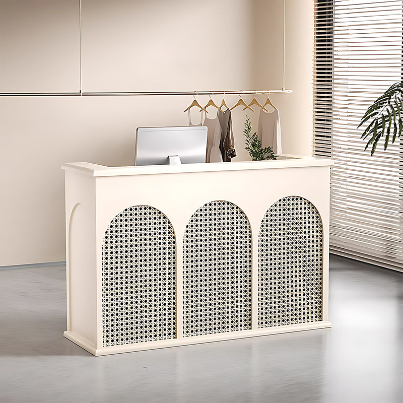 Sophisticated Minimalist Reception Desk Featuring Distinctive Perforations