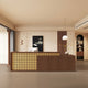 Refined Vintage Reception Desk with Woven Rattan for Office Lobbies